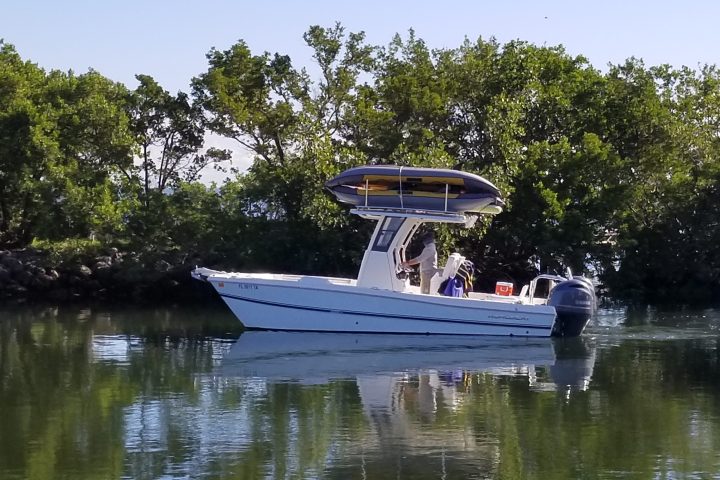 a small boat in a body of water