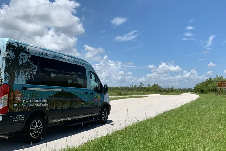 a bus that is parked on the side of a road