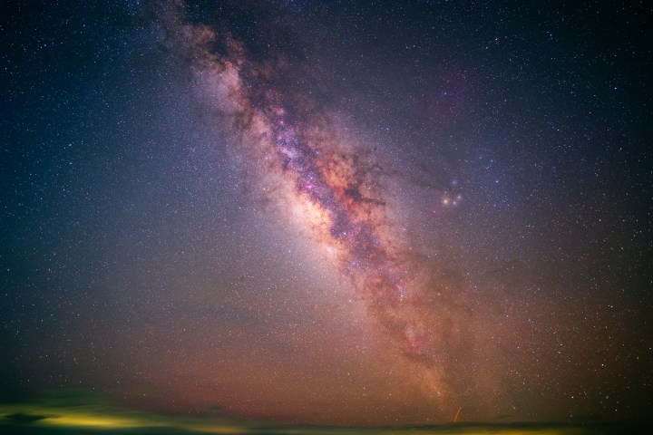Bright Milky Way galaxy against a dark starry sky.